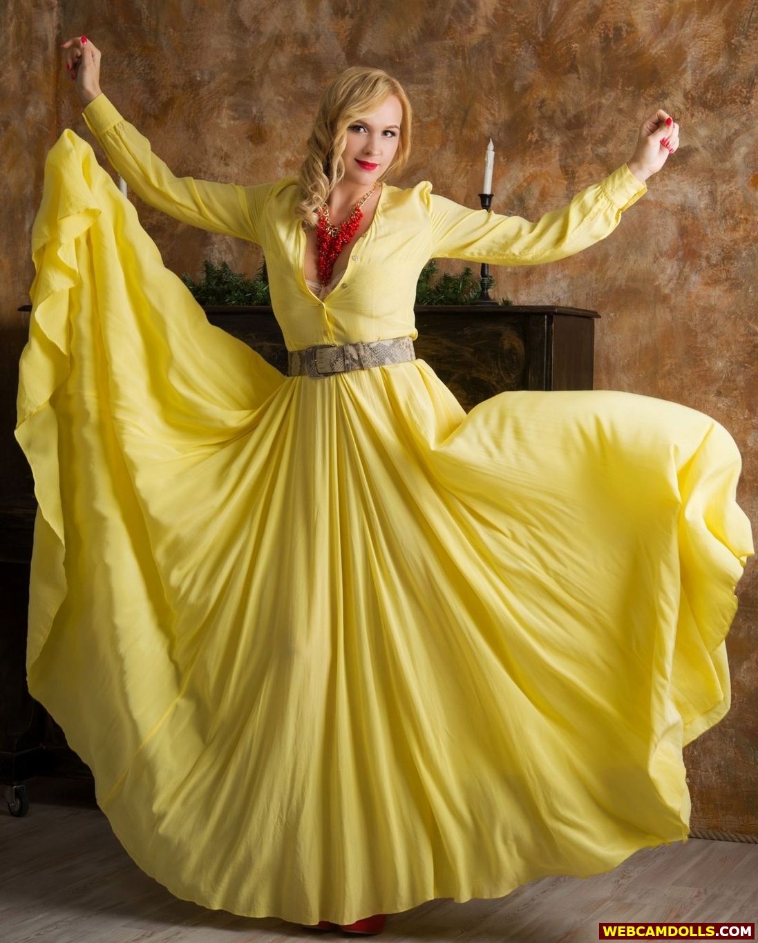 Blonde MILF wearing Lace Bra under Yellow Long Dress on Webcamdolls
