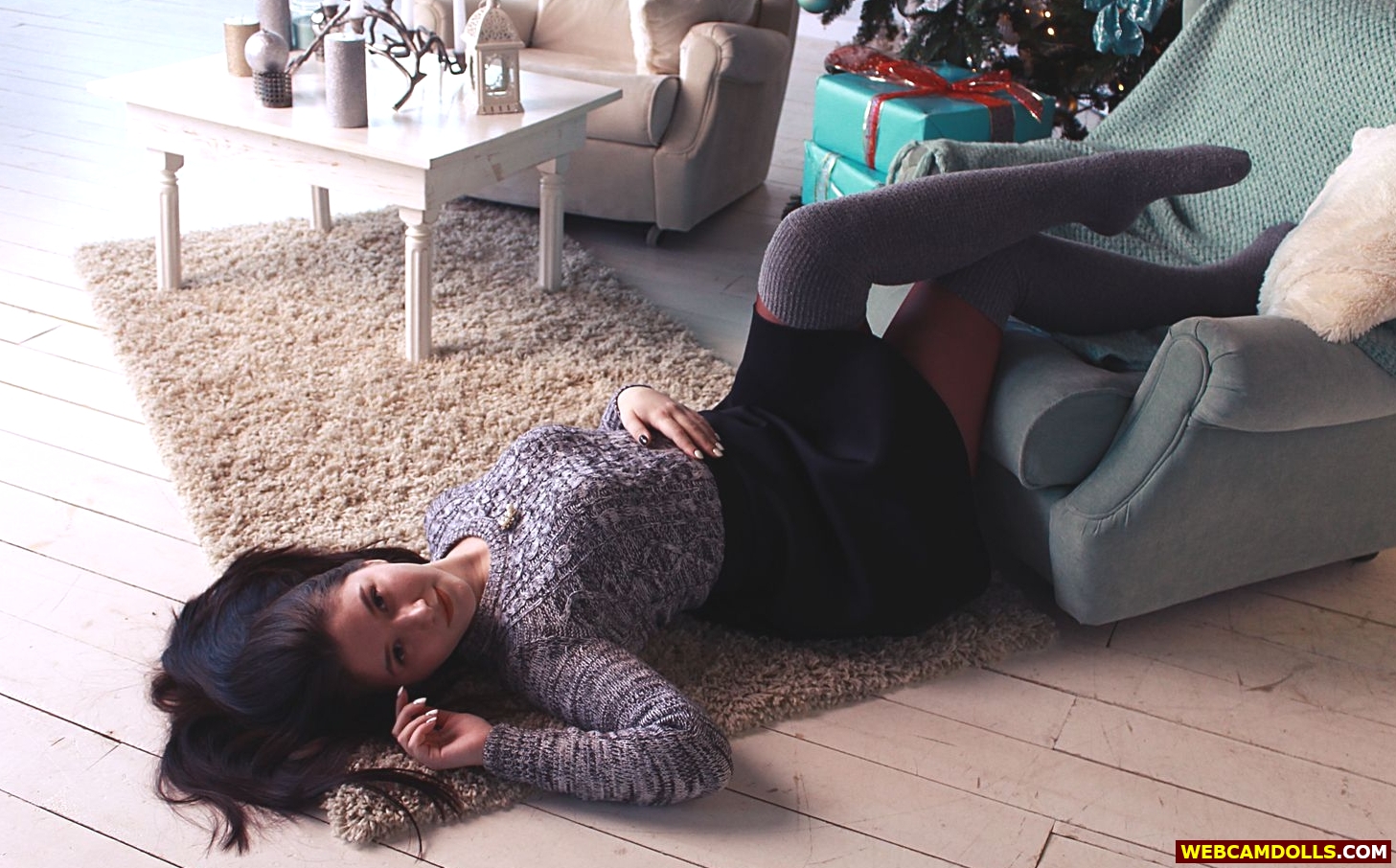 Brunette Teenage Girl in Grey Woollen Stockings and Sweater on Webcamdolls