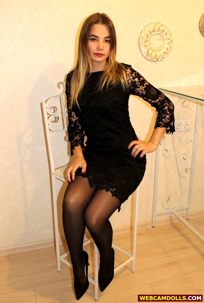 Blonde Teen Girl in Black Sheer Shiny Pantyhose and Lace Short Dress on Webcamdolls