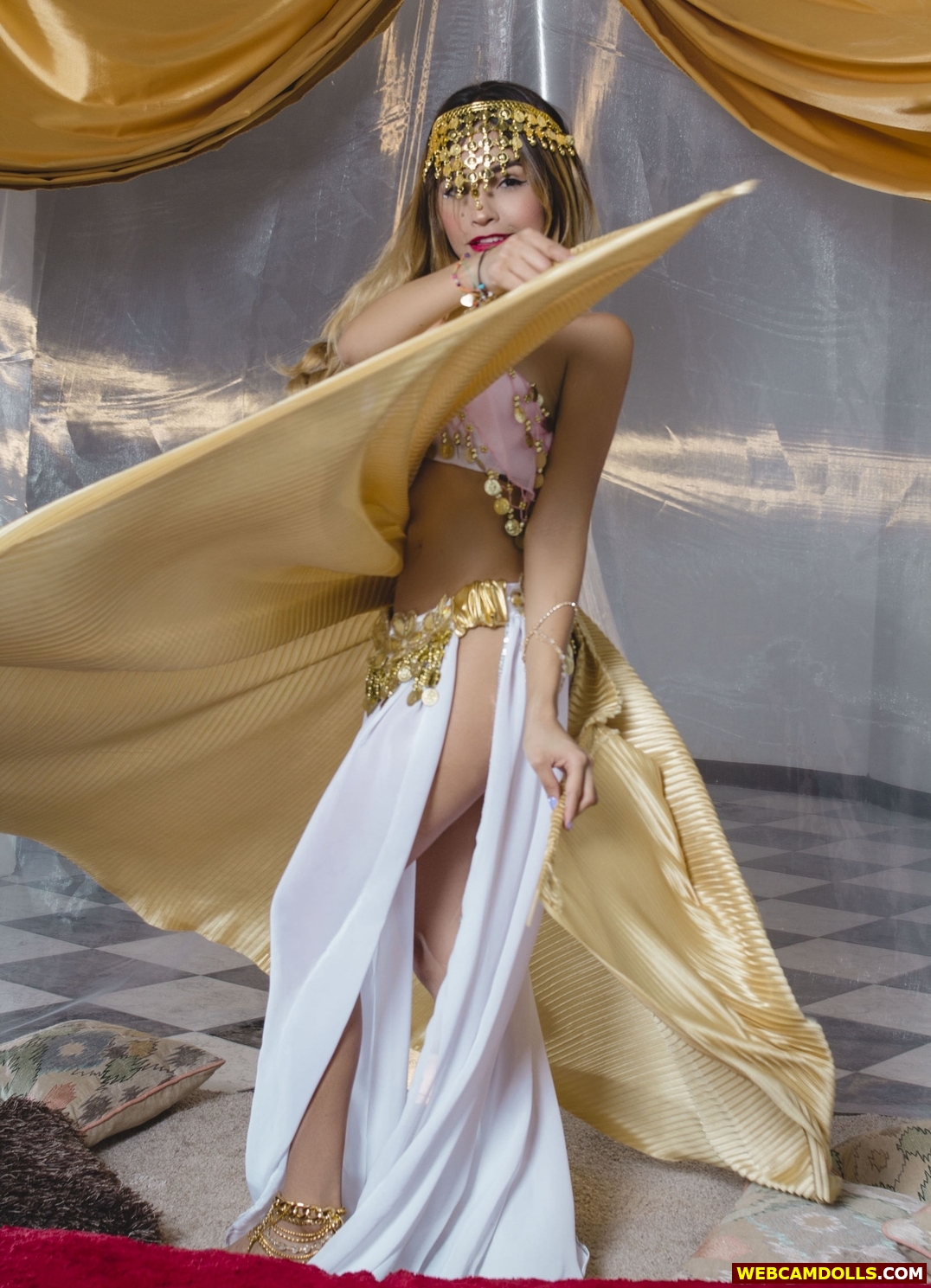 Blonde Latina Girl dancing in Golden Arab Dress on Webcamdolls