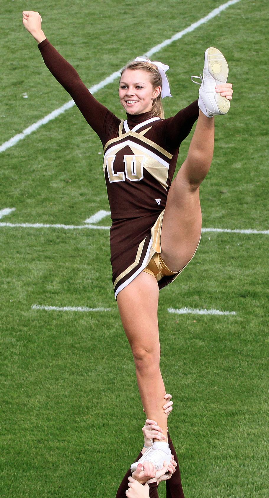Cheerleader showing Upskirt in Short Dress, Socks and Golden Panties.