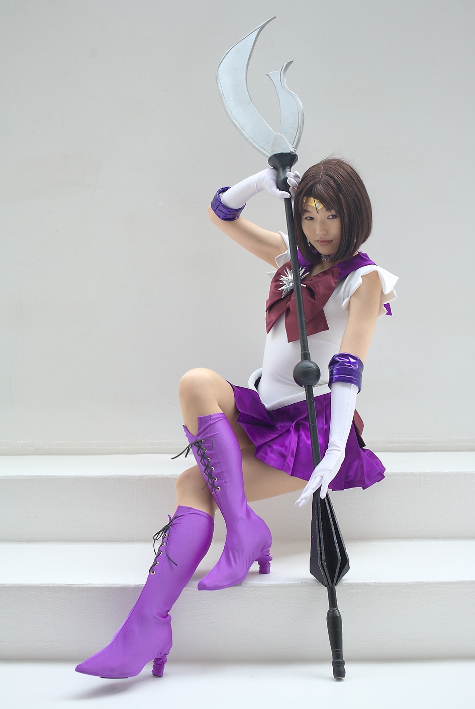 Brunette Asian Cosplay Girl wearing Sailor Moon Costume, Purple Miniskirt and Boots with Heels