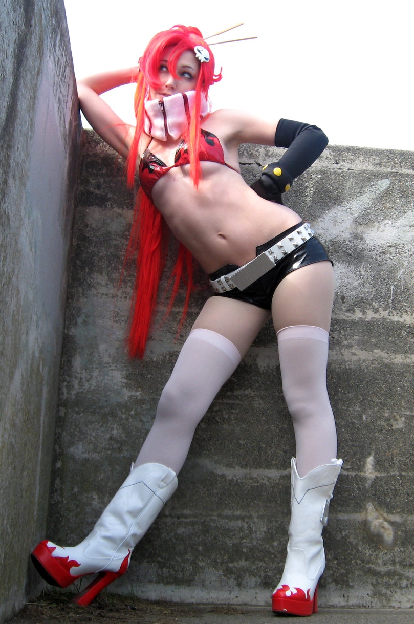 Redhead Cosplay Girl wearing Yoko Costume, White Lycra Stockings and Black Latex Shorts
