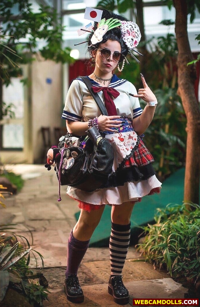 Cosplay Girl in Japansese Schoolgirl Costume and Knee High Socks on Webcamdolls